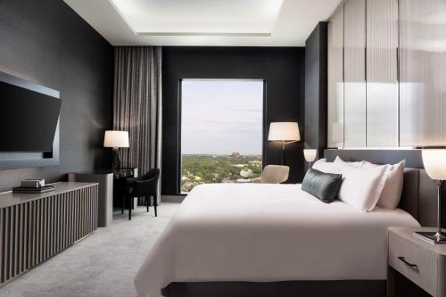 Ένα ή περισσότερα κρεβάτια σε δωμάτιο στο Loews Arlington Hotel
