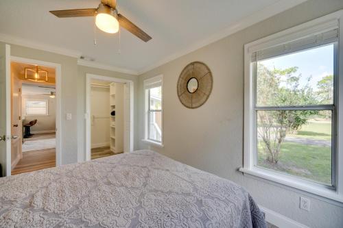 a bedroom with a bed and a window at Apopka Home with Yard and Grill Near Wekiwa Springs! in Apopka