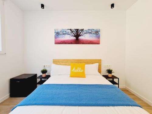 Ένα ή περισσότερα κρεβάτια σε δωμάτιο στο Bilbao ROOMS Miribilla