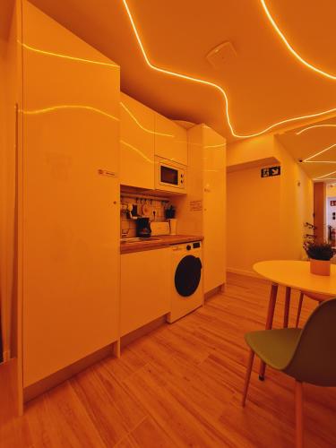 Η κουζίνα ή μικρή κουζίνα στο Bilbao ROOMS Miribilla