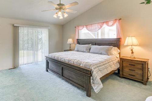 a bedroom with a large bed and a window at Moyie Springs Home with Views, Near Kootenay River! in Bonners Ferry