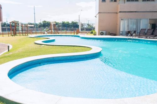 Πισίνα στο ή κοντά στο Apartamento condomínio Bech Village Fortaleza