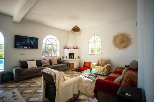 Χώρος καθιστικού στο Villa Les jardins fleuris 4 bedrooms