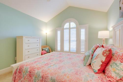 a bedroom with a bed and a dresser and a window at 6 Mi to Bethany Beach Family Home with BBQ and Yard in Ocean View