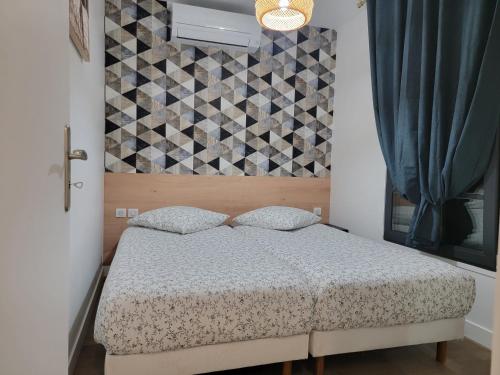 Ένα ή περισσότερα κρεβάτια σε δωμάτιο στο Villa Junon