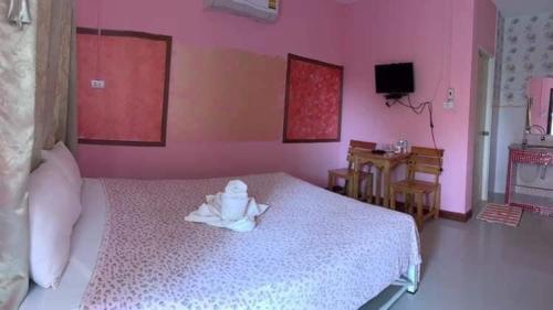 Katil atau katil-katil dalam bilik di ภูรักษ์ รีสอร์ท