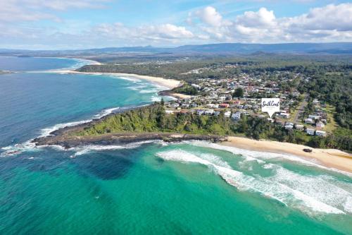 an aerial view of a beach and the ocean at Manyana Beach Break in Manyana