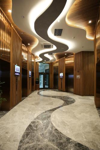 a lobby with domed ceilings in a building at 3Br Ecopark apt Onsen! Balcony lake view Free Pool in HÆ°ng YÃªn
