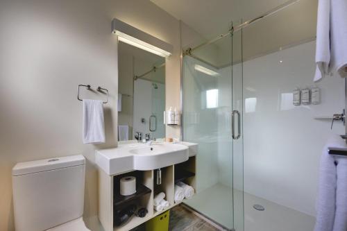 Koupelna v ubytování Ava Lodge