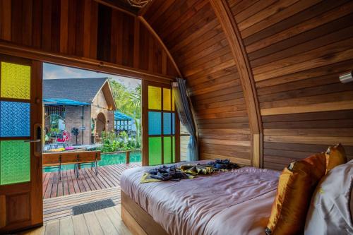 Postel nebo postele na pokoji v ubytování Plaiphu Pool Villas