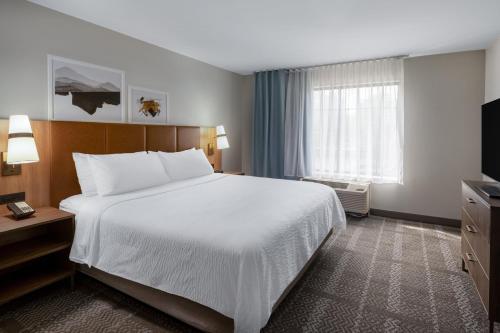 Ένα ή περισσότερα κρεβάτια σε δωμάτιο στο Staybridge Suites West Des Moines by IHG