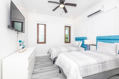 เตียงในห้องที่ Acqua di Mare Resort