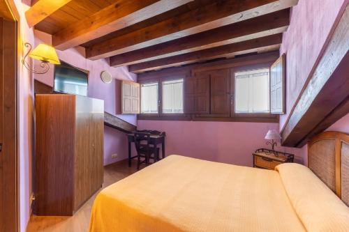 Postel nebo postele na pokoji v ubytování Casa Alval