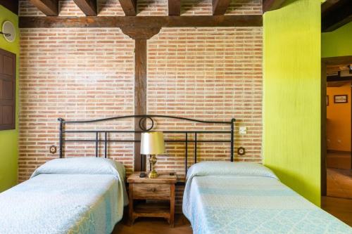 Postel nebo postele na pokoji v ubytování Casa Alval