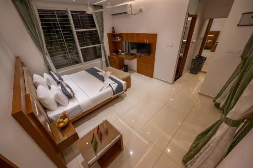 Un ou plusieurs lits dans un hébergement de l'établissement S R Spa Suites