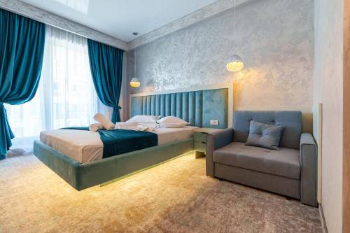 Postel nebo postele na pokoji v ubytování HOTEL KALYA