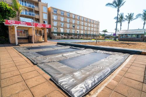 a building under construction in front of a building at ATKV Natalia in Kingsburgh