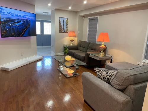 a living room with a couch and a table at Finesse in Whitby