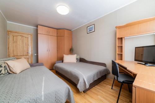 Katil atau katil-katil dalam bilik di Monic Apartments