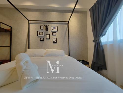 Una cama o camas en una habitación de Setia Alam Edu Sentral # JSA Walking Distance # Setia Convention Centre & Setia City Mall
