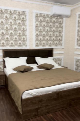 Llit o llits en una habitació de Grand Hotel