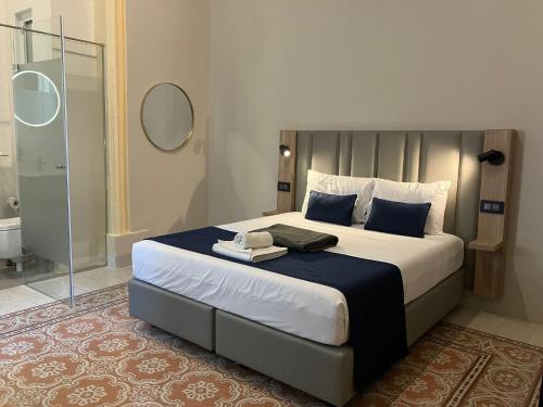 Postel nebo postele na pokoji v ubytování Mulberry Suites
