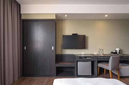 Una cocina o zona de cocina en 河堤漫旅-自立館River inn Zili