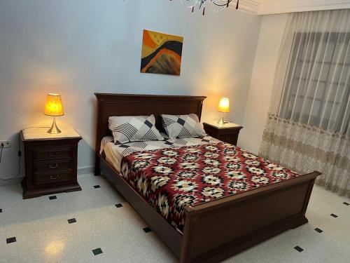 Postel nebo postele na pokoji v ubytování Étage de villa Yasmine