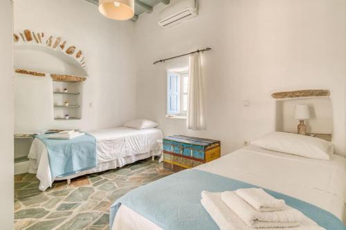 Postel nebo postele na pokoji v ubytování Vaya House - Feeling Greek