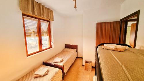 Ένα ή περισσότερα κρεβάτια σε δωμάτιο στο Relaxing italian seaside apartment
