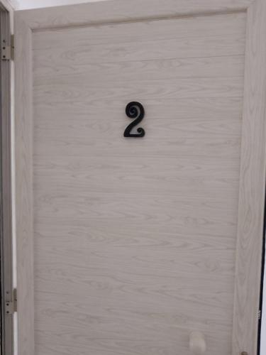 a door with the number eight on it at Villa3 Cancelli Guesthouse B&B via del Mare Formia in Formia