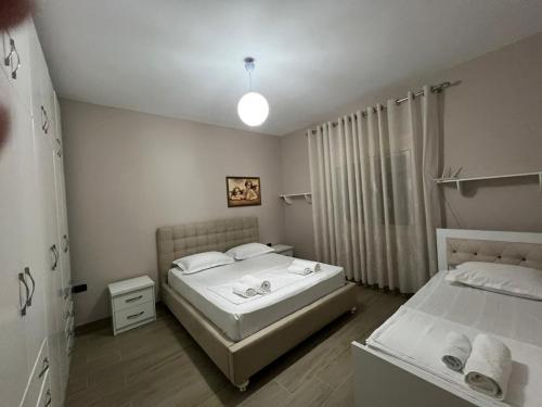 Katil atau katil-katil dalam bilik di Large Apartment