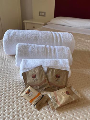 Postel nebo postele na pokoji v ubytování TC HOTEL