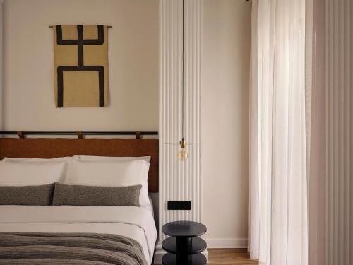 Postel nebo postele na pokoji v ubytování Astikon House