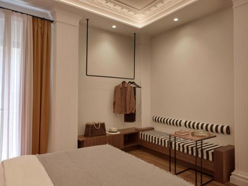 Postel nebo postele na pokoji v ubytování Astikon House