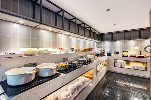 Photo de la galerie de l'établissement Poltton International Apartment - Foshan Gaoming Yingxin Plaza, à Foshan