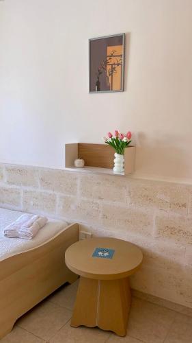 Ένα ή περισσότερα κρεβάτια σε δωμάτιο στο Casa Rilù