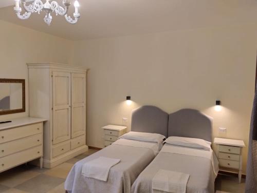 Ένα ή περισσότερα κρεβάτια σε δωμάτιο στο Hotel Internazionale