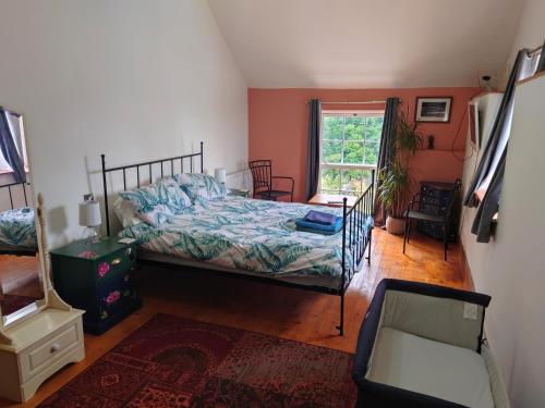 Ένα ή περισσότερα κρεβάτια σε δωμάτιο στο Villa Rosa