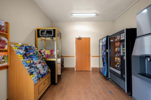 a store with two refrigerators and a video game at Comfort Inn & Suites in Fenton
