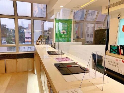 a store with a counter with glasses on it at The Salvation Army - Booth Lodge in Hong Kong