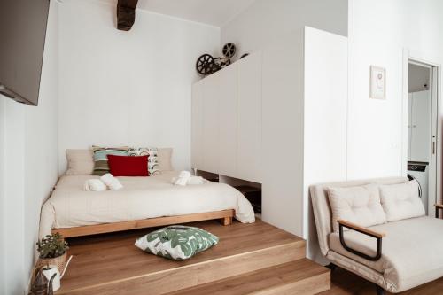 Una cama o camas en una habitación de Mercanti Modern Flat - Balcony - Torino centro