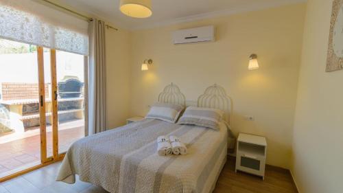 Postel nebo postele na pokoji v ubytování Casa El Cerrillo Cómpeta by Ruralidays