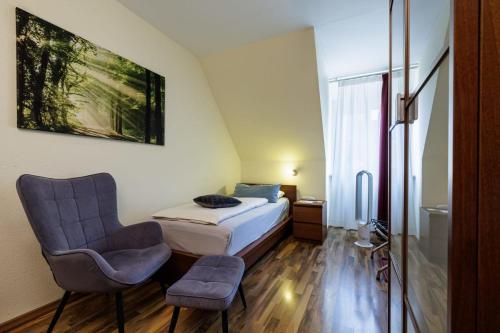 Ένα ή περισσότερα κρεβάτια σε δωμάτιο στο Flair Hotel Hopfengarten