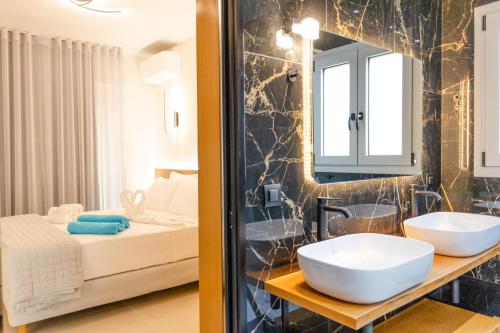 Ένα ή περισσότερα κρεβάτια σε δωμάτιο στο Infinity Lefkas Villas