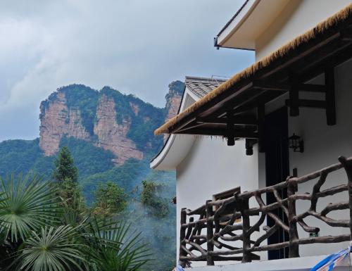 a building with a view of the mountains at Celestial Valley in Zhangjiajie
