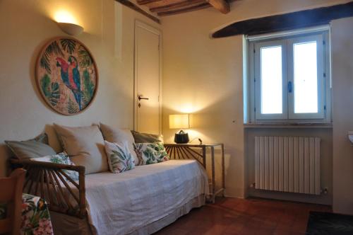 Postel nebo postele na pokoji v ubytování Agriturismo SPA Serpanera