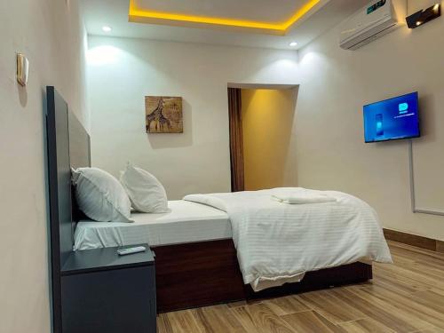 Postel nebo postele na pokoji v ubytování Sha'an Residence