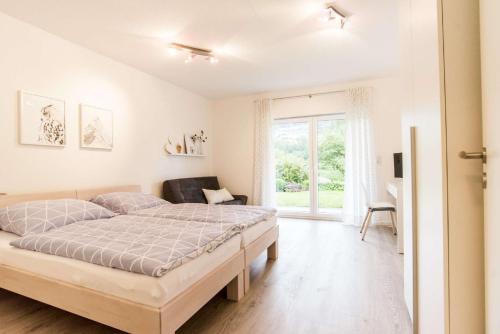 Postel nebo postele na pokoji v ubytování Ferienwohnung Am Holing