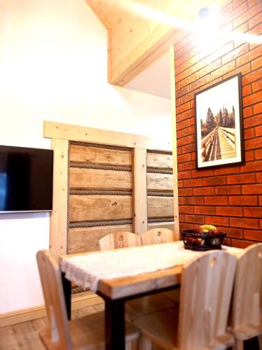 TV a/nebo společenská místnost v ubytování Apartamenty Przy Rynku Szaflary